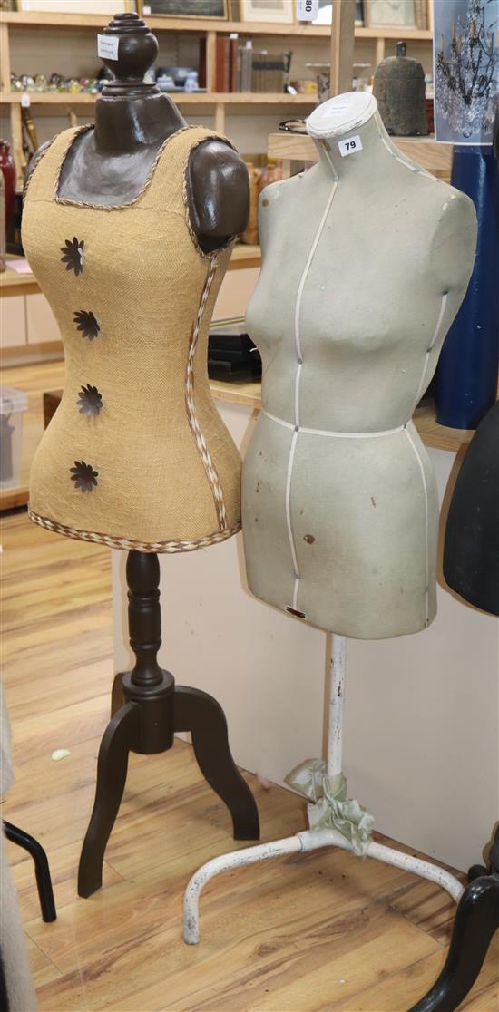 A dress makers dummy, with fabric torso and another